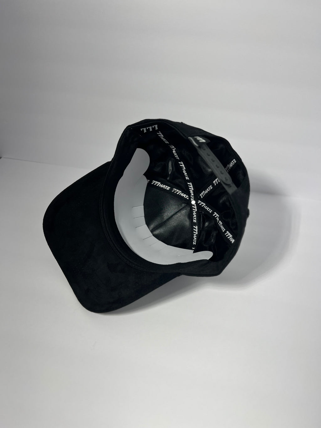 All black 777 with crosses and rhinestones