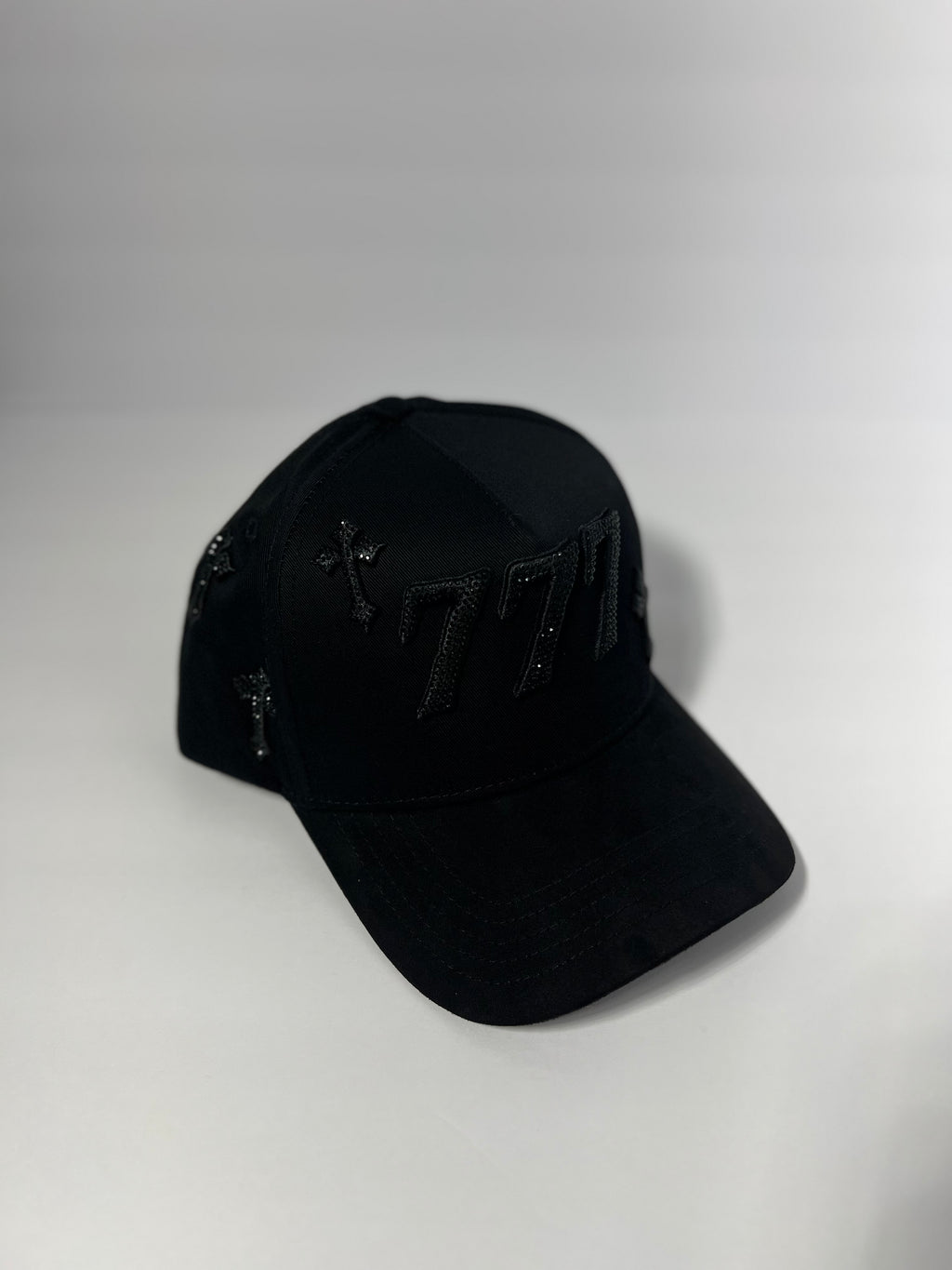 All black 777 with crosses and rhinestones